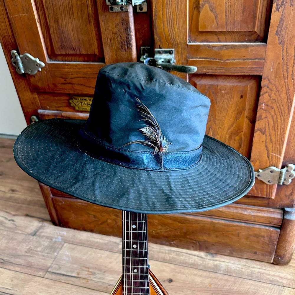 Barbour waxed Hat with feather.